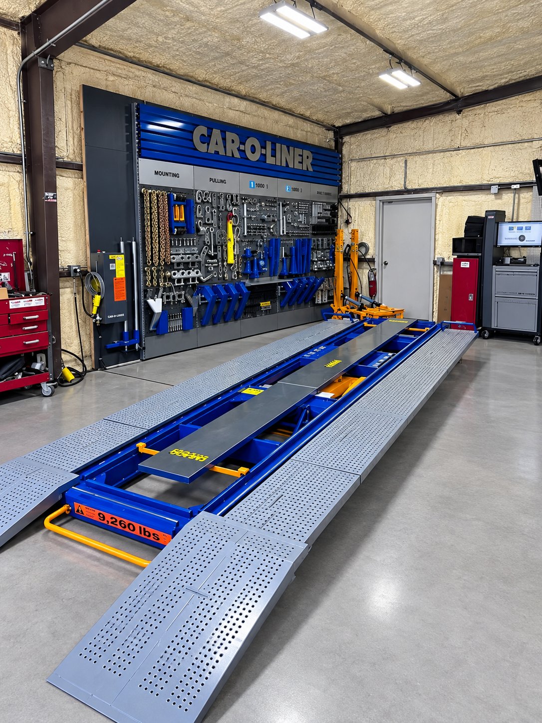 Car-O-Liner frame alignment bench inside the No Limit Auto Body shop